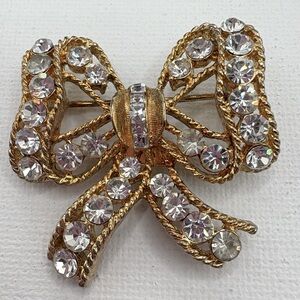 Eisenberg Ice .Gold and Silver VTG Bow Brooch with sparkling Rhinestones